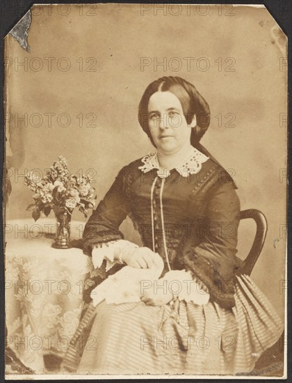 Portrait of seated woman, about 1860-1870. Creator: Unknown.