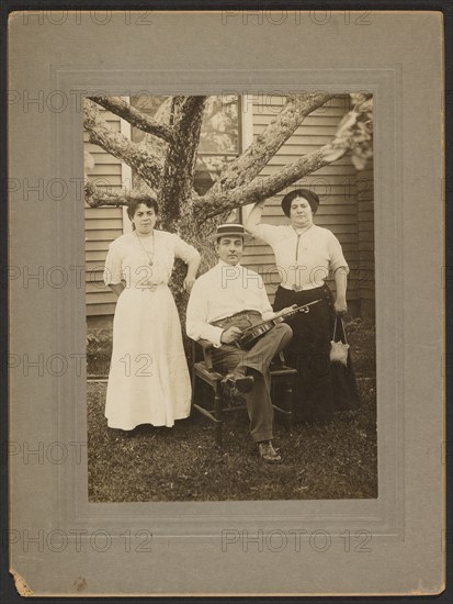 Portrait of a man and two women, about 1890-1900. Creator: Unknown.