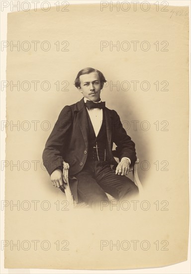 Portrait of a Seated Young Man, about 1858. Creator: Gustave Le Gray.