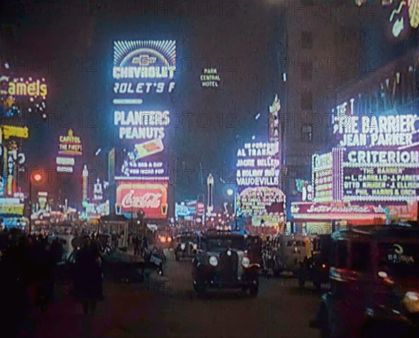 New York Times Square at Night Lit up By Lights, 1920s. Creator: British Pathe Ltd.