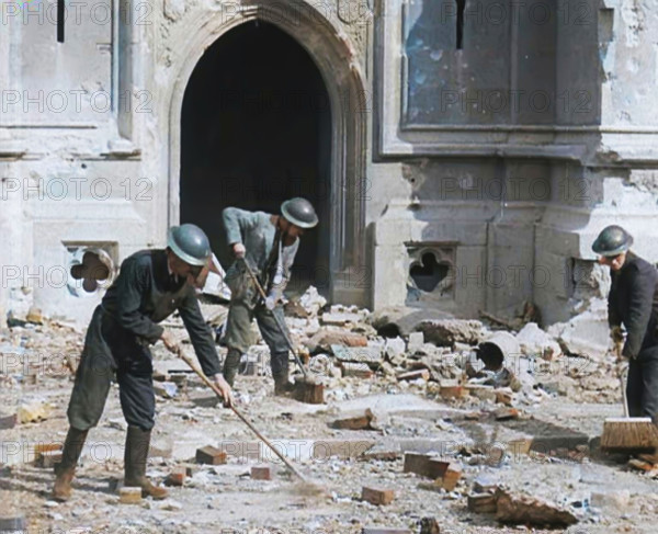 British Air Raid Wardens Clearing up Rubble Around the Palace of Westminster, 1941. Creator: British Pathe Ltd.