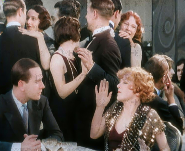 Scene from the Film 'Champagne': Betty Balfour in a Nightclub Drinking Champagne and..., 1920s. Creator: British Pathe Ltd.