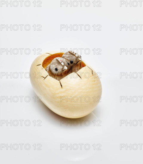 Netsuke (two chicks hatching from egg), 19th century. Creator: Ohara Mitsuhiro.