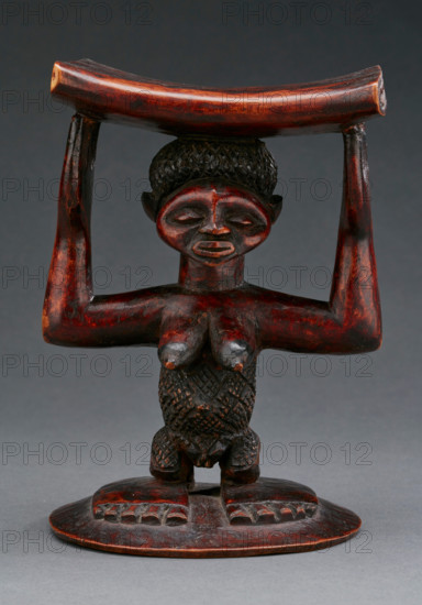 Headrest with female figure, late 19th century. Creator: Unknown.