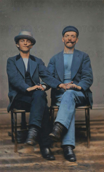 Two Seated Young Men Holding Hands, 1880s. Creator: Unknown.