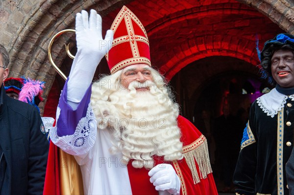 ENSCHEDE, THE NETHERLANDS - NOV 13, 2021: Portrait of the the dutch Santa Claus called 'Sinterklaas' while he is arriving in town.