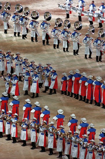 The Olympic band performs before an audience of 110,000 (Not shown), September 15th, 2000, during the opening ceremonies for the Sydney 2000 Olympics. Fifteen US Military athletes (Not shown) are competing in the 2000 Olympic games as members of the US Olympic team. In addition to the fifteen competing athletes there are eight alternates and five coaches (Not shown) representing each of the four services in various venues. Base: Sydney State: New South Wales Country: Australia (AUS)