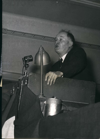 Dec. 23, 1955 - Electoral Campaign of Maurice Thorez: Mr Maurice Thorez, General Secretary of the French Communist party, helped by deputy Georges Cogniot made an address yesterday to the population of the 4th Parisian sector, in choisy, where Mr.Thorez is candidate. Photo shows An attitude of Mr, Thorez.