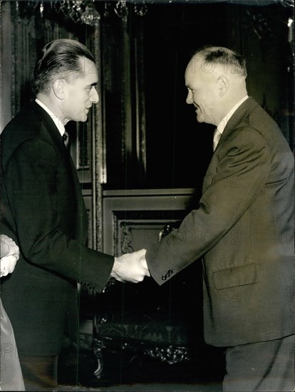 Oct. 10, 1959 - Speaker of French Parliament holds reception: M. Chaban Delmas, speaker of the National Assembly, gave a reception on his official residence Last Night. M. Chaban Delmas shakes hands with M.Maurice Thorez, communist leader during the reception last night. Next to M Chaban Delmas, his wife.