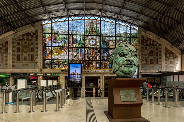 Sculpture and colorful stained glass window, Bilbao-Abando Railway Station ,Basque Country, Bilbao,Spain