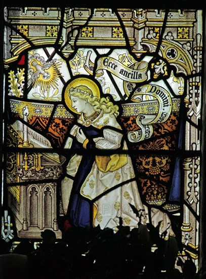 A stained glass window by C E Kempe & Co depicting the Annunciation to Mary, St Michael's Church, Barton, near Pooley Bridge, Cumbria