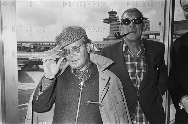 Arrival of writer Truman Capote (left) and director Richard Brooks at Schiphol Airport for the premiere of the film In Cold Blood (In Cold Blood), March 14, 1968, authors, films, directors, writers, airports, The Netherlands, 20th century press agency photo, news to remember, documentary, historic photography 1945-1990, visual stories, human history of the Twentieth Century, capturing moments in time