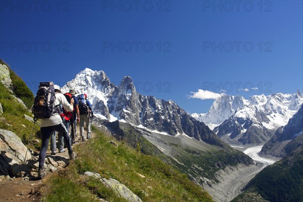 French Alps in summer. Hikers in the Chamonix valley. France