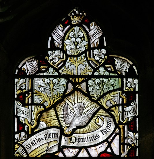 Detail of a stained glass window by Charles E.Steel depicting the White Dove of the Holy Spirit, St Giles Church, Exhall, Warwickshire