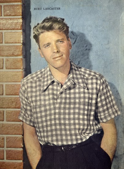 A vintage Hollywood publicity still of Burt Lancaster in the early 1950s from a film fan magazine.