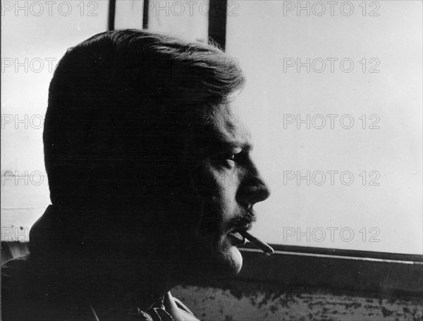 Portrait of actor Marcello Mastroianni smoking a cigarette