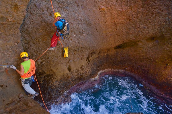 canyoning in the canyon called Souffleur on the cliff of La Ciotat, France, Provence, Calanques National Park, La Ciotat