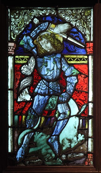 Saint George. Gothic stained glass window from 15th century. Krivoklat Castle, Czech Republic. Exhibition 'Castles and Chateaux: Rediscovered and Celebrated' at the Prague Castle Riding School in Prague, Czech Republic.