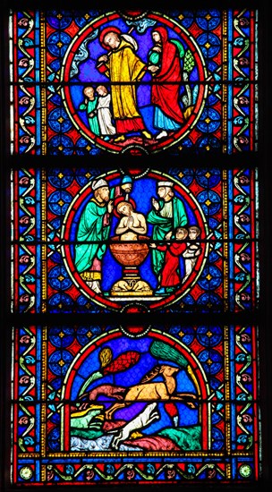 Stained Glass in Notre Dame Cathedral of Paris depicting scenes in the Life of Saint Joseph, husband of Mary, Mother of Jesus