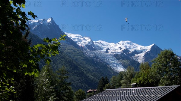 Paraglider paragliding in French Alps, Chamonix, Mont Blanc, France