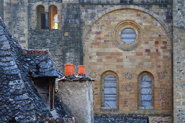 CONQUES, FRANCE, June 19, 2015 : The St.Foy abbey in Conques is a popular stop for pilgrims on their way to Santiago de Compostela. The main draw for