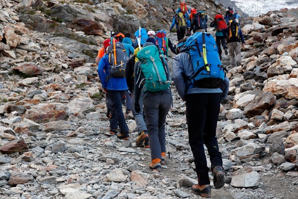 Alpinists during the ascent of Mont Blanc along the regular route via Gouter Refuge.   France.