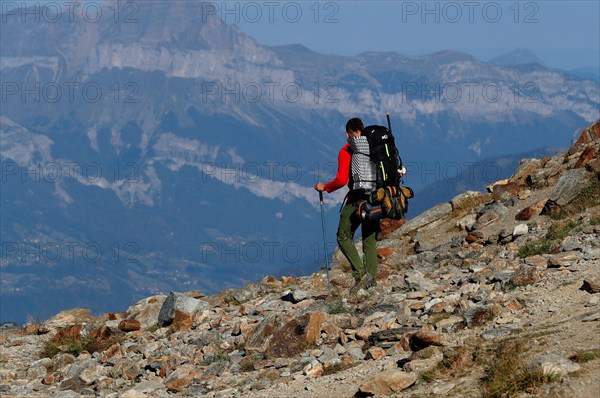 Mountain hiker during the ascent of Mont Blanc along the regular route via Gouter Refuge. Frenh Alps.   France.