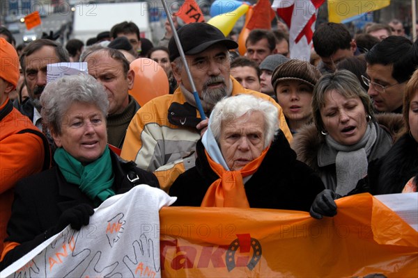 Orange revolution in Ukraine. Elderly woman attends the demonstration of Ukrainian migrants in the Czech Republic to support Ukrainian oppositional presidential candidate Viktor Yushchenko in Wenceslas Square in Prague, Czech Republic, on November 28, 2004.