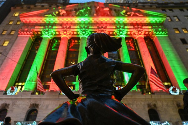 The Fearless Girl statue stands in front of the New York Stock Exchange (NYSE) on Wall Street on December 2, 2022 in New York.