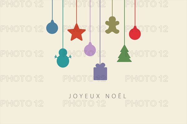 Greeting card with Merry Christmas lettering  in French (Joyeux Noël) and christmas decorations