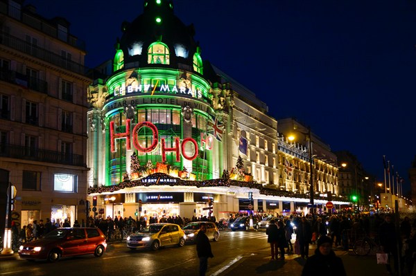 Bazar de l'Hôtel de Ville or BHV, department store, at night with christmas lights, Paris, France.