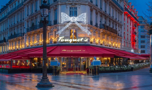 Paris, France-November 26, 2016 : The Christmas decoration on Fouquet's restaurant located at Champs Elysees avenue in Paris.