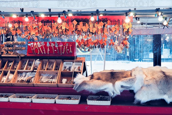 Winter Saami Souvenirs such as reindeer fur and horns in Finnish Christmas Market, Rovaniemi, Finland, Lapland. At the North Arctic Pole.