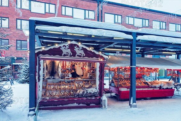 Winter Saami Souvenirs on Street Finnish Christmas Market in Rovaniemi, Finland, Lapland. At the North Arctic Pole.