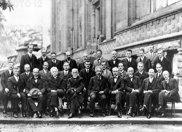 1927 Solvay Conference on Quantum Mechanics. Institut International de Physique Solvay. Back to front, from left to right, Auguste Piccard, Émile Henriot, Paul Ehrenfest, Édouard Herzen, Théophile de Donder, Erwin Schrödinger, Jules-Émile Verschaffelt, Wolfgang Pauli, Werner Heisenberg, Ralph Howard Fowler, Léon Brillouin, Peter Debye, Martin Knudsen, William Bragg, Hendrik Kramers, Paul Dirac, Arthur Compton, Louis de Broglie, Max Born, Niels Bohr, Irving Langmuir, Max Planck, Marie Curie, Hendrik Lorentz, Albert Einstein, Paul Langevin, Charles-Eugène Guye, Charles Wilson, Owen Richardson