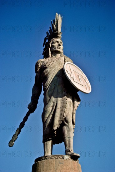 Statue of Cuauhtémoc on the Paseo de los Heroes in Tijuana, Mexico. Cuauhtémoc was the Aztec ruler of Tenochtitlan from 1520 to 1521, making him the last Aztec Emperor. The name Cuauhtemoc means "one who has descended like an eagle."