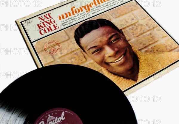 Jazz artist, Nat King Cole music album on vinyl record LP disc. Titled: Unforgettable album cover