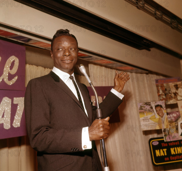 NAT KING COLE (1919-1965) American singer in 1964. Photo Tony Gale