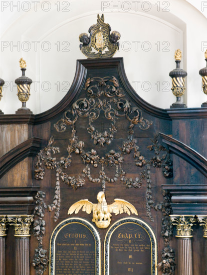 St Mary Abchurch London by  Sir Christopher Wren after Great Fire,  Grinling Gibbons carvings above altar with phoenix