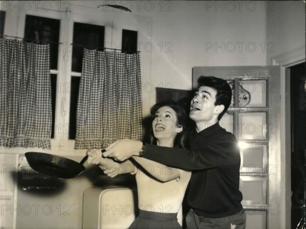 Jan. 01, 1959 -  Candlemas: Photo shows Pascale Audret And Claude Titre, the new couple No.1 of the French screen, busy making pancakes for Candlemas.