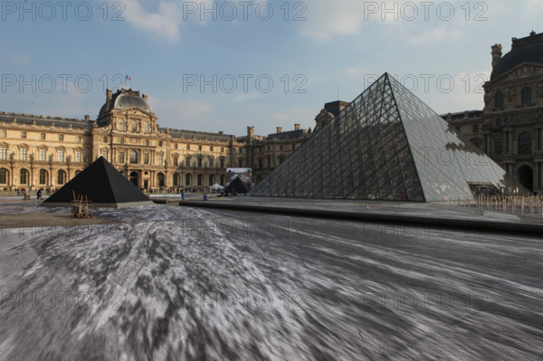 The street artist JR transforms the courtyard of the Louvre. For the 30th anniversary of the Louvre Pyramid, from March 26 to March 31, 2019 by instal