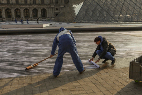 The street artist JR transforms the courtyard of the Louvre. For the 30th anniversary of the Louvre Pyramid, from March 26 to March 31, 2019 by instal