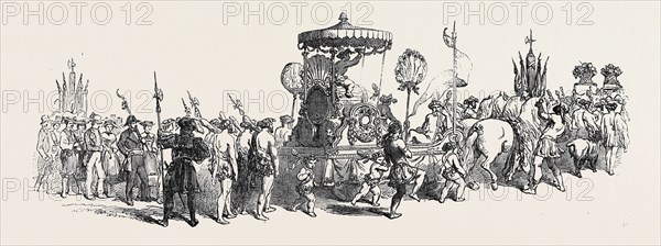 LA FETE DES VIGNERONS, AT VEVEY: THE PEOPLE WALKING ON THE LEFT REPRESENT WINTER; IN THE CENTRE CAN BE SEEN THE CAR OF BACCHUS AND PEOPLE REPRESENTING AUTUMN