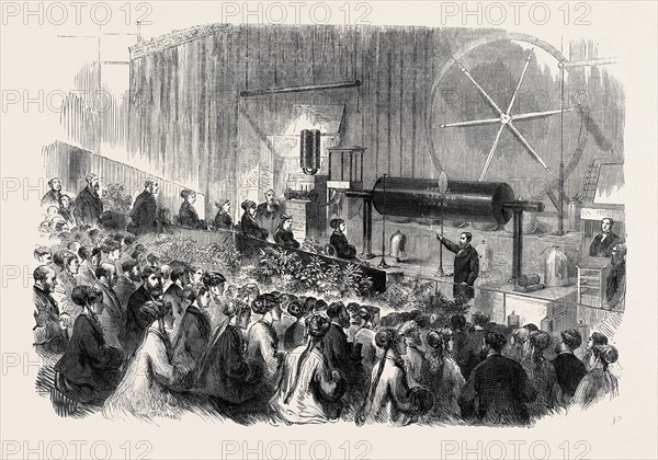 THE GREAT ELECTRIC INDUCTION COIL AT THE POLYTECHNIC INSTITUTION, 1869