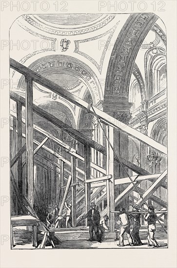 PREPARATIONS FOR THE FUNERAL OF THE DUKE OF WELLINGTON, IN ST. PAUL'S CATHEDRAL: VIEW IN THE SOUTH AISLE, 1852