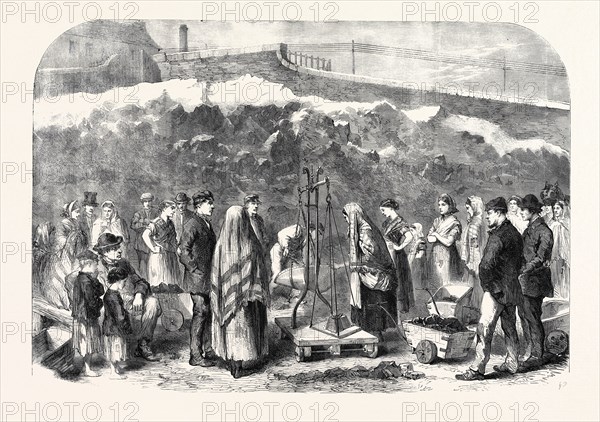 THE COTTON FAMINE: DISTRIBUTING COAL AT THE CASTLE FIELD OLD COAL-WHARF, MANCHESTER, 1862