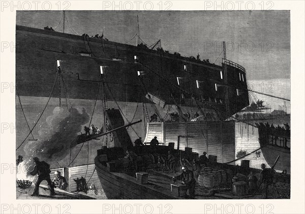 LAUNCH OF THE NORTHUMBERLAND: FIXING THE CAMELS AT NIGHT, 1866