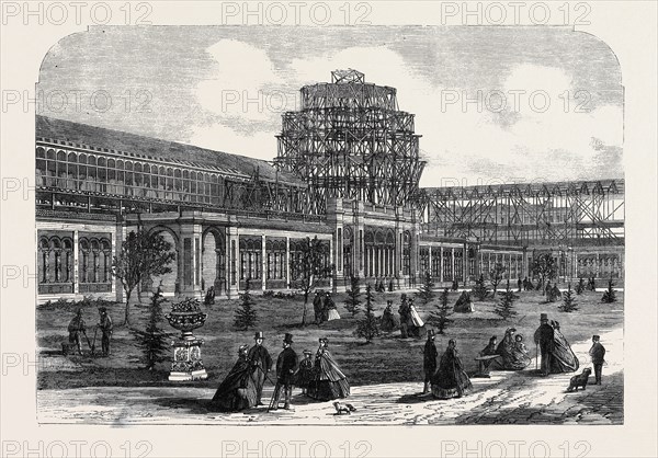 PROGRESS OF THE INTERNATIONAL EXHIBITION BUILDING: VIEW OF THE BUILDING FROM THE ROYAL HORTICULTURAL SOCIETY'S GARDENS