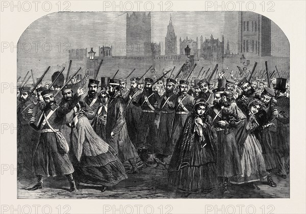 REINFORCEMENTS FOR CANADA: THE GUARDS CROSSING WESTMINSTER BRIDGE ON THEIR WAY TO THE SOUTH WESTERN RAILWAY STATION, DECEMBER 28, 1861