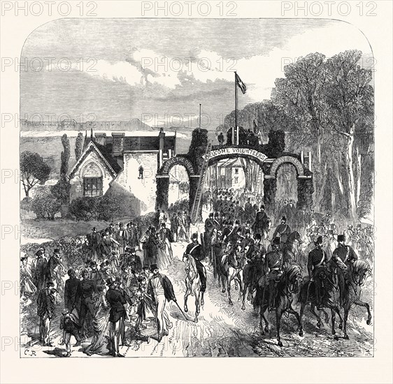 THE VOLUNTEER REVIEW AT PORTSMOUTH: THE 1ST MIDDLESEX ARTILLERY PASSING THROUGH COSHAM ON GOOD FRIDAY, 1868